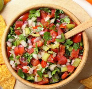 Crohn's friendly mango salsa with tomatoes, red onion, cilantro, jalapeño, and lime