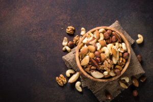 Bowl of nuts and seeds used for Crohn’s friendly homemade granola.