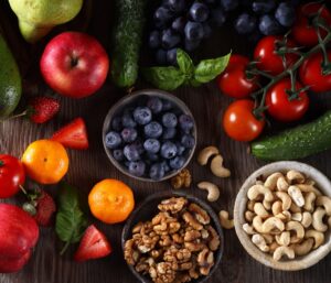 Colorful assortment of vegetables, fruits, nuts, seeds